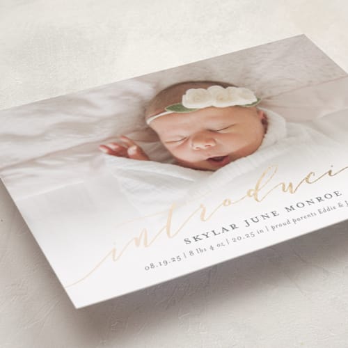 This is a slate foil stamped birth announcements with foil pressed by Sarah Brown called treasured printing on smooth signature in standard