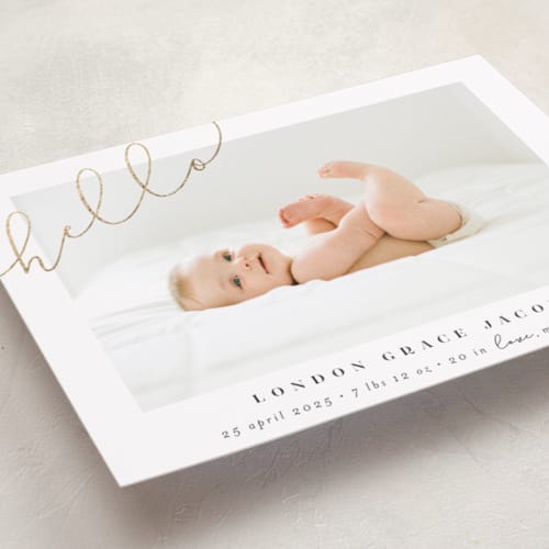 This is a warm grey foil stamped birth announcements with foil pressed by Shirley Lin Schneider called angled hello printing on smooth signature in standard