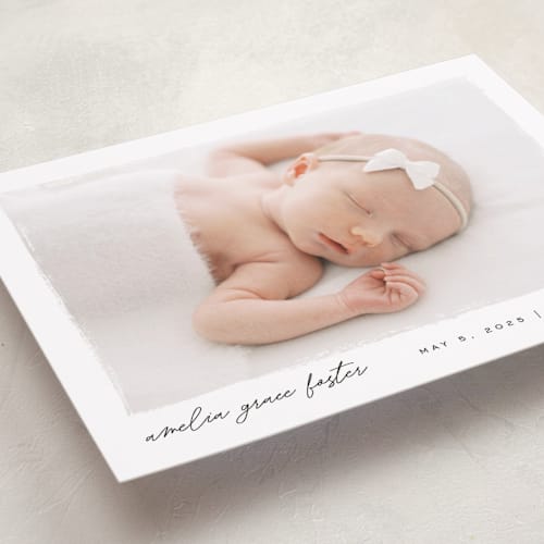 This is a snow birth announcements with standard by Pixel and Hank called edgy printing on smooth signature in standard