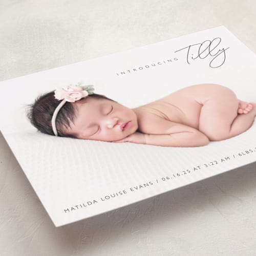 This is a raven birth announcements with standard by Olivia Raufman called nickname intro printing on smooth signature in standard