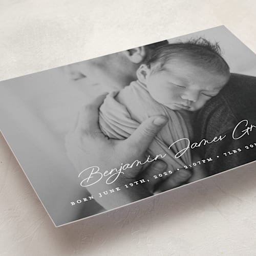 This is a snow birth announcements with standard by Bethan called handwriting printing on smooth signature in standard