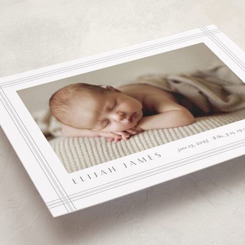 This is a cement birth announcements with standard by Stacey Meacham called soft plaid printing on smooth signature in standard