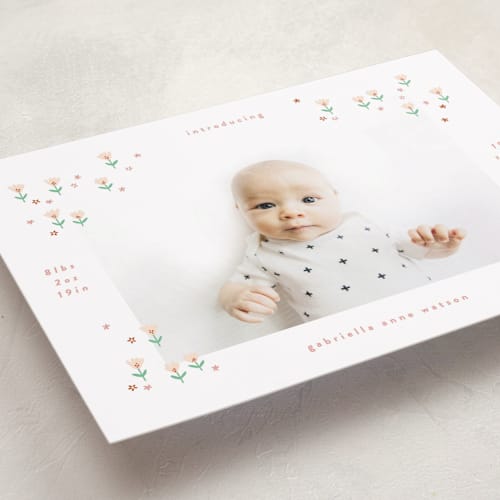 This is a spring birth announcements with standard by Phrosné Barwood called tiny blooms printing on recycled smooth signature in standard