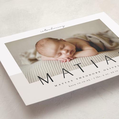 This is a ivory birth announcements with standard by Maria Hilas-Louie called big news printing on smooth signature in standard