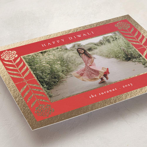This is a vermillion diwali cards with foil pressed by letterfix called marigold frame printing on recycled smooth signature in standard
