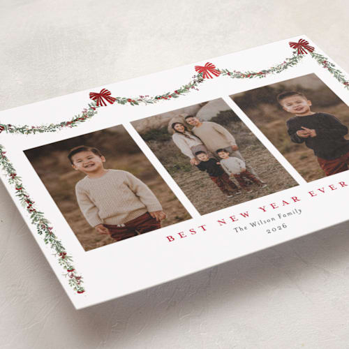 This is a peppermint foil pressed holiday cards with foil pressed by Susan Moyal called joyful holly printing on recycled smooth signature in standard