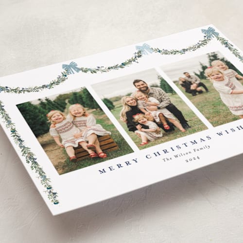 This is a wintermint foil pressed holiday cards with foil pressed by Susan Moyal called joyful holly printing on recycled smooth signature in standard