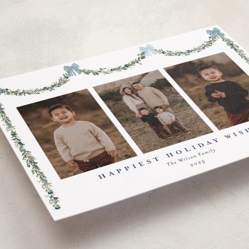 This is a wintermint foil pressed holiday cards with foil pressed by Susan Moyal called joyful holly printing on recycled smooth signature in standard