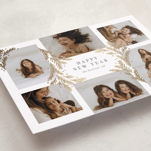 This is a snowball foil pressed holiday cards with foil pressed by Michelle Taylor called gilded greenery printing on recycled smooth signature in standard