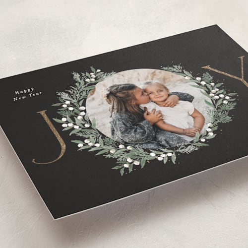 This is a coal foil pressed holiday cards with foil pressed by Itsy Belle Studio called joy wreath printing on recycled smooth signature in standard