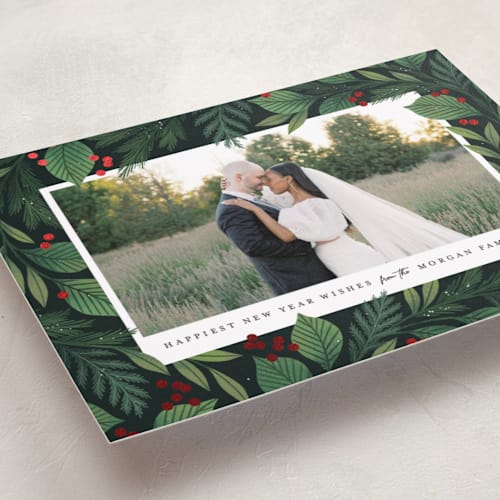 This is a forest foil pressed holiday cards with foil pressed by Paper Raven Co. called encircled printing on recycled smooth signature in standard