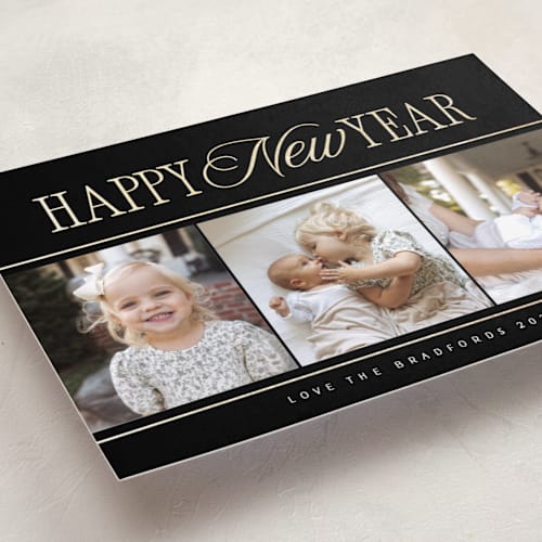 This is a noir foil pressed holiday cards with foil pressed by Nicole Walsh called new year trio printing on recycled smooth signature in standard