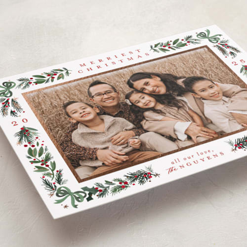 This is a forest foil pressed holiday cards with foil pressed by Makewells called sparkly bows printing on recycled smooth signature in standard