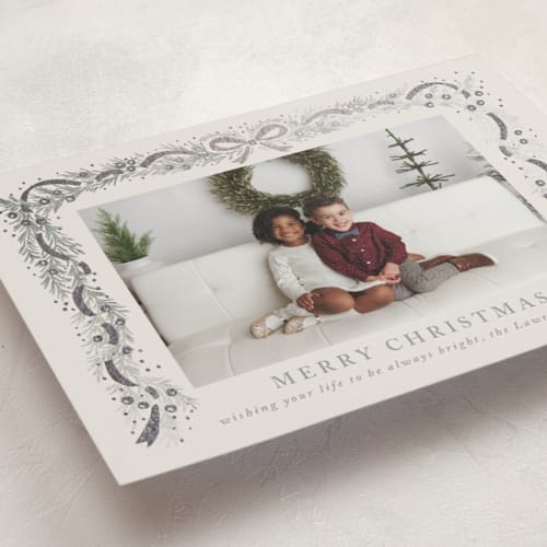 This is a silver bell foil pressed holiday cards with foil pressed by Petra Kern called timeless printing on recycled smooth signature in standard