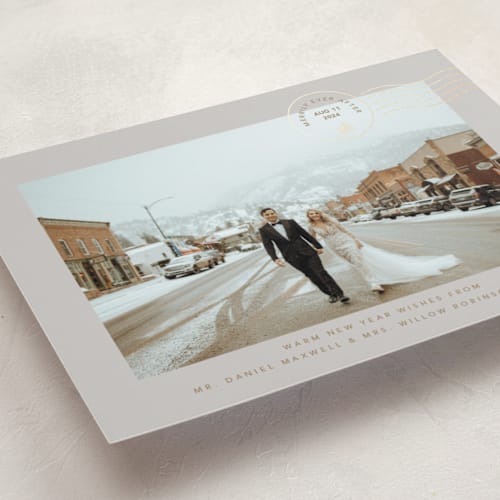 This is a mist foil pressed holiday cards with foil pressed by Kate Ross called postcard printing on recycled smooth signature in standard
