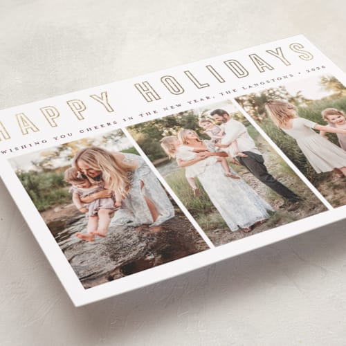 This is a snow foil pressed holiday cards with foil pressed by Juliana Zimmermann called triple happiness printing on recycled smooth signature in standard