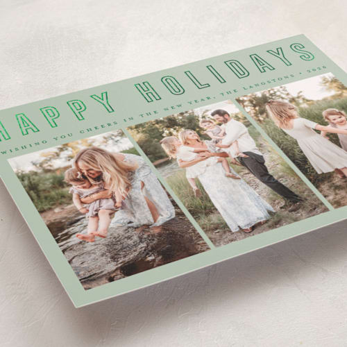 This is a elf shoes foil pressed holiday cards with foil pressed by Juliana Zimmermann called triple happiness printing on recycled smooth signature in standard