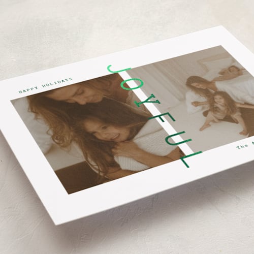 This is a verdant foil pressed holiday cards with foil pressed by Ana Sharpe called joyful den printing on recycled smooth signature in standard