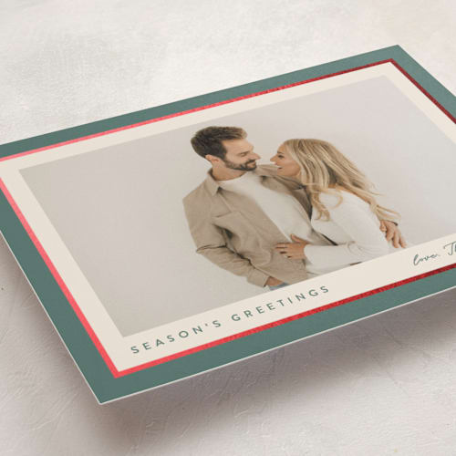 This is a holly sprig foil pressed holiday cards with foil pressed by Carolyn MacLaren called ribbon frame printing on recycled smooth signature in standard
