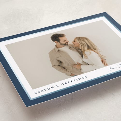 This is a glacier foil pressed holiday cards with foil pressed by Carolyn MacLaren called ribbon frame printing on recycled smooth signature in standard