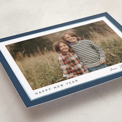 This is a glacier foil pressed holiday cards with foil pressed by Carolyn MacLaren called ribbon frame printing on recycled smooth signature in standard