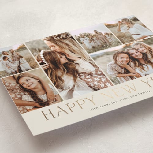 This is a coal foil pressed holiday cards with foil pressed by Kimberly Morgan called holiday photo grid printing on recycled smooth signature in standard