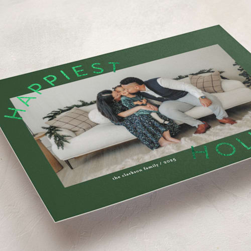 This is a evergreen foil pressed holiday cards with foil pressed by Jessica Williams called round and round printing on recycled smooth signature in standard