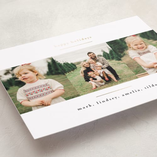 This is a crisp snow foil pressed holiday cards with foil pressed by Kate Ross called modern minimalist printing on recycled smooth signature in standard