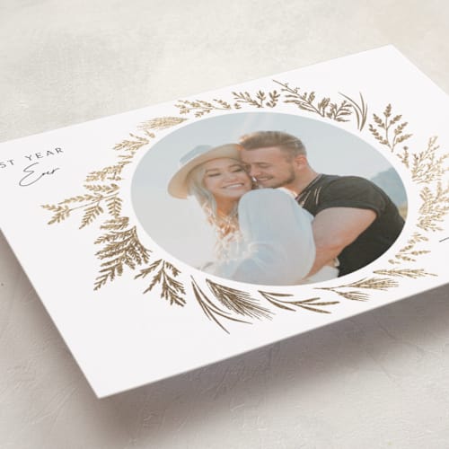 This is a snowflake foil pressed holiday cards with foil pressed by Susan Moyal called gold wreath printing on recycled smooth signature in standard