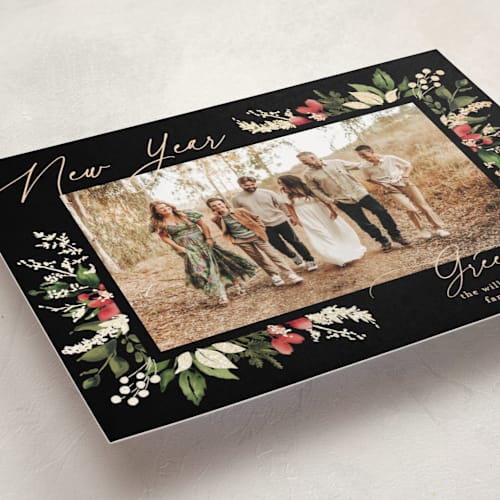 This is a ebony foil pressed holiday cards with foil pressed by Chris Griffith called a sparkle of holiday printing on recycled smooth signature in standard
