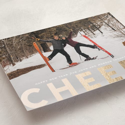 This is a snowflake foil pressed holiday cards with foil pressed by Sara Hicks Malone called c h e e r s ! printing on recycled smooth signature in standard