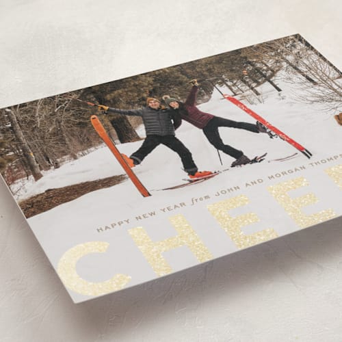 This is a toffee foil pressed holiday cards with foil pressed by Sara Hicks Malone called c h e e r s ! printing on recycled smooth signature in standard