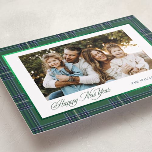 This is a evergreen foil pressed holiday cards with foil pressed by Cindy Reynolds called navy baby printing on recycled smooth signature in standard