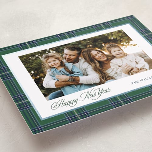 This is a evergreen foil pressed holiday cards with foil pressed by Cindy Reynolds called navy baby printing on recycled smooth signature in standard