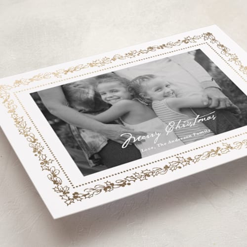 This is a snow foil pressed holiday cards with foil pressed by Cass Loh called gilded botanical frame printing on recycled smooth signature in standard