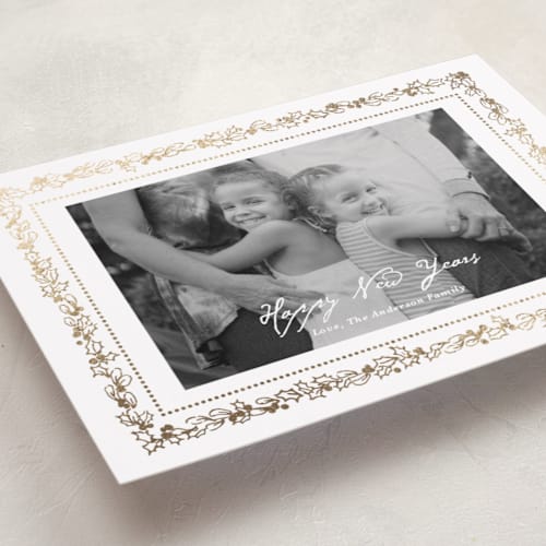 This is a snow foil pressed holiday cards with foil pressed by Cass Loh called gilded botanical frame printing on recycled smooth signature in standard