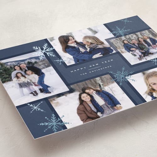 This is a navy foil pressed holiday cards with foil pressed by Wildfield Paper Co called gilded flurries printing on recycled smooth signature in standard