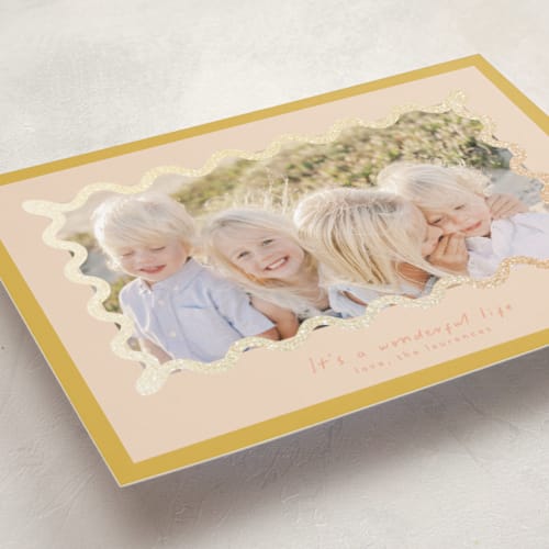 This is a mango foil pressed holiday cards with foil pressed by Blustery August called party squiggle printing on recycled smooth signature in standard