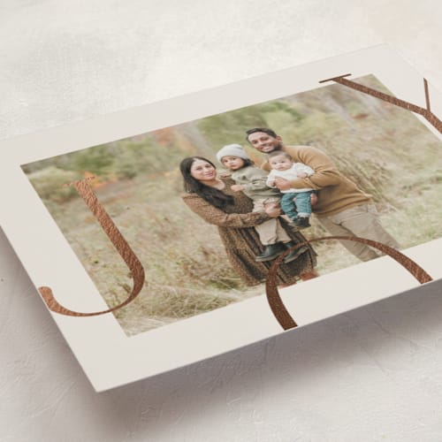 This is a cookie dough foil pressed holiday cards with foil pressed by Brianne Larsen called joy border printing on recycled smooth signature in standard