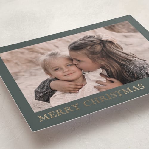 This is a fern foil pressed holiday cards with foil pressed by Chris Griffith called engraved holiday printing on recycled smooth signature in standard