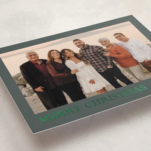 This is a fern foil pressed holiday cards with foil pressed by Chris Griffith called engraved holiday printing on recycled smooth signature in standard