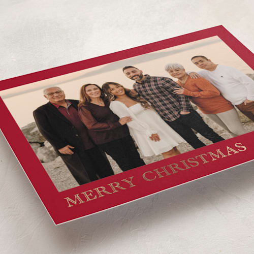 This is a cherry foil pressed holiday cards with foil pressed by Chris Griffith called engraved holiday printing on recycled smooth signature in standard