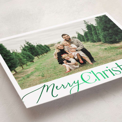 This is a evergreen foil pressed holiday cards with foil pressed by Carolyn MacLaren called merry mix printing on recycled smooth signature in standard