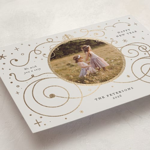 This is a ivory foil pressed holiday cards with foil pressed by Amy Payne called disney's cinderella carriage printing on recycled smooth signature in standard