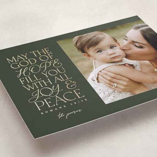 This is a fir foil pressed holiday cards with foil pressed by Pink House Press called filled with love printing on recycled smooth signature in standard