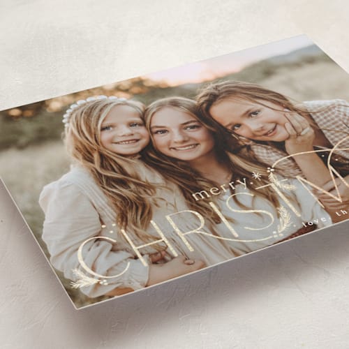 This is a stocking foil pressed holiday cards with foil pressed by Makewells called delicate greenery printing on recycled smooth signature in standard