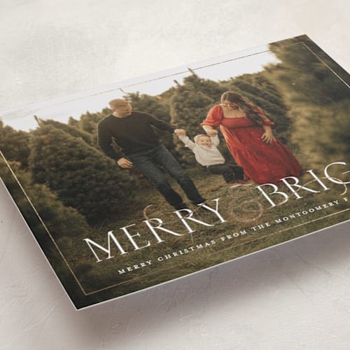 This is a snow foil pressed holiday cards with foil pressed by Meggy Masters called festive ampersand printing on recycled smooth signature in standard