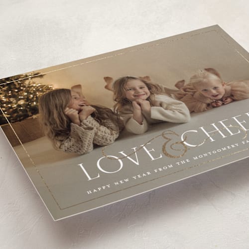 This is a snow foil pressed holiday cards with foil pressed by Meggy Masters called festive ampersand printing on recycled smooth signature in standard