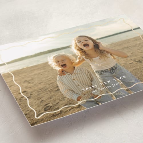 This is a snow foil pressed holiday cards with foil pressed by Ellen Schlegelmilch called wavy border printing on recycled smooth signature in standard