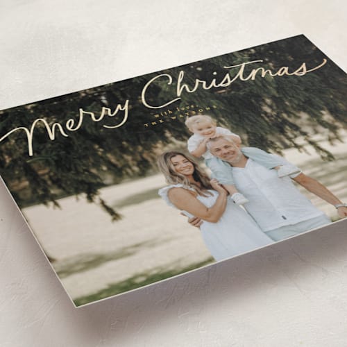 This is a golden foil pressed holiday cards with foil pressed by Everett Paper Goods called simply delighted printing on recycled smooth signature in standard